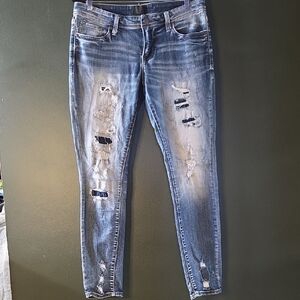 Buckle Black Women's Ripped Skinny Jeans